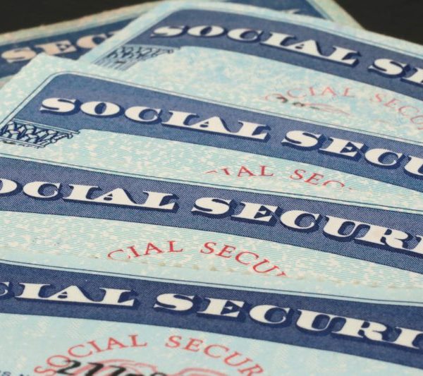 A pile of Social Security cards is pictured here.