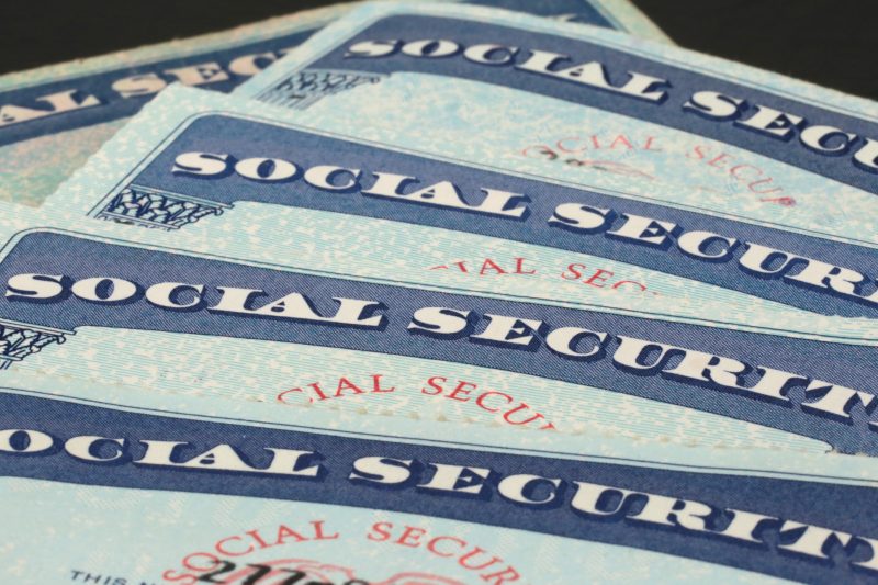 A pile of Social Security cards is pictured here.