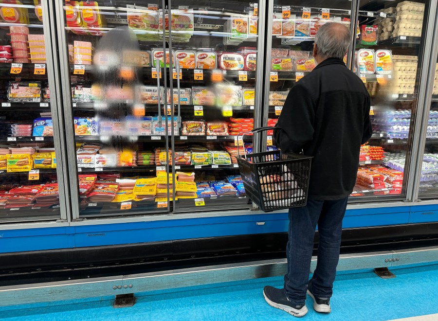 A customer shops for food at a grocery store on March 12, 2024 in San Rafael, California.