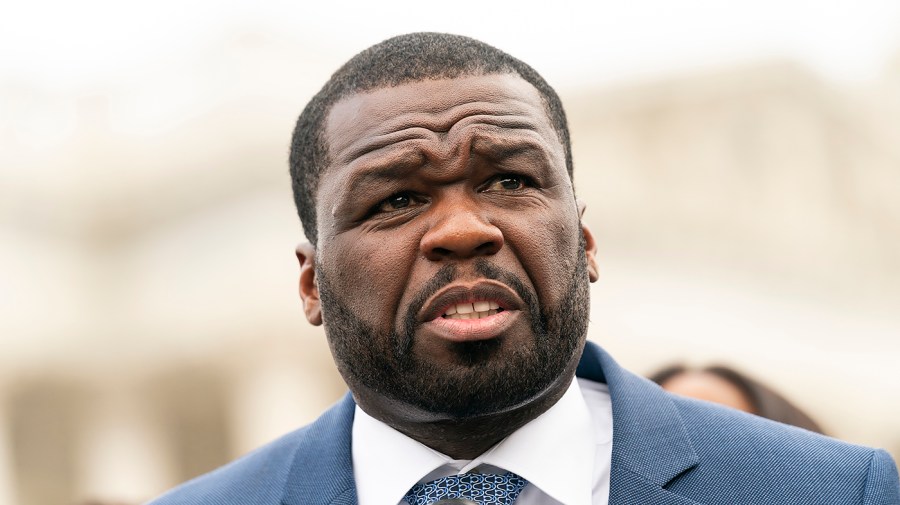 Curtis '50 Cent' Jackson addresses reporters.