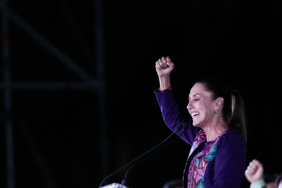 President-elect Claudia Sheinbaum addresses supporters at the Zocalo, Mexico City's main square, after the National Electoral Institute announced she held an irreversible lead in the election, early Monday, June 3, 2024. (AP Photo/Marco Ugarte)