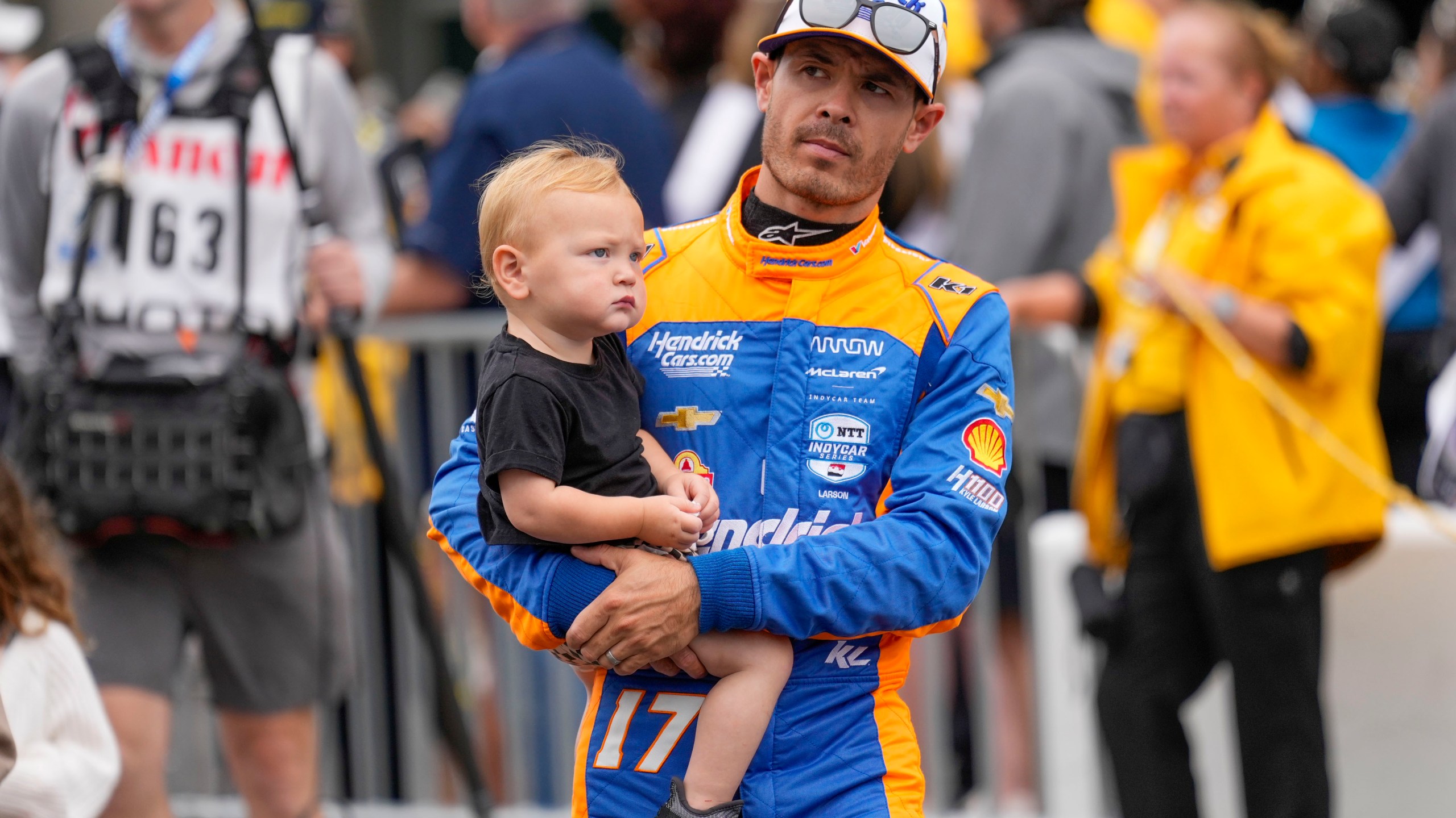 Kyle Larson walks out during driver introductions before the Indianapolis 500 auto race at Indianapolis Motor Speedway in Indianapolis, Sunday, May 26, 2024. (AP Photo/AJ Mast)