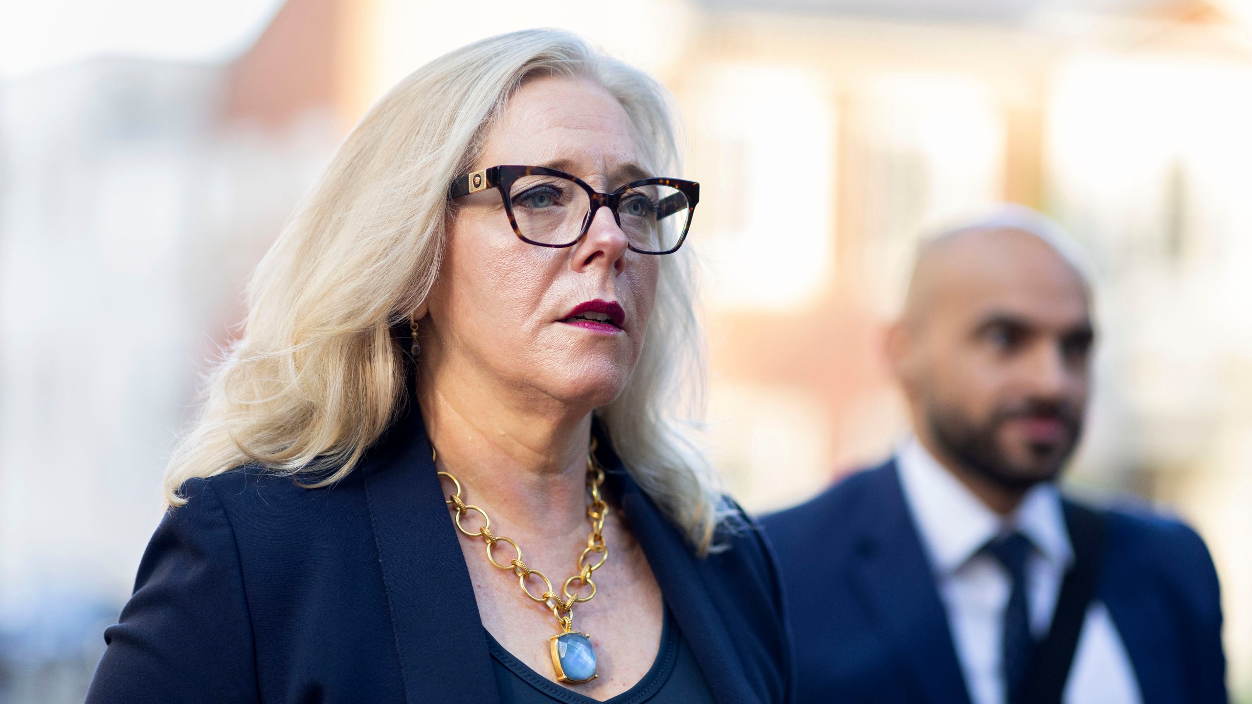 Henrico Commonwealth's Attorney Shannon Taylor arrives at the Albemarle County Circuit Court in Charlottesville, Va., Tuesday, June 4, 2024. Years after a white nationalist rally erupted in violence in Charlottesville, a trial is set to begin Tuesday for Jacob Joseph Dix ,one of the people charged with using flaming torches to intimidate counterprotesters. (AP Photo/Ryan M. Kelly)