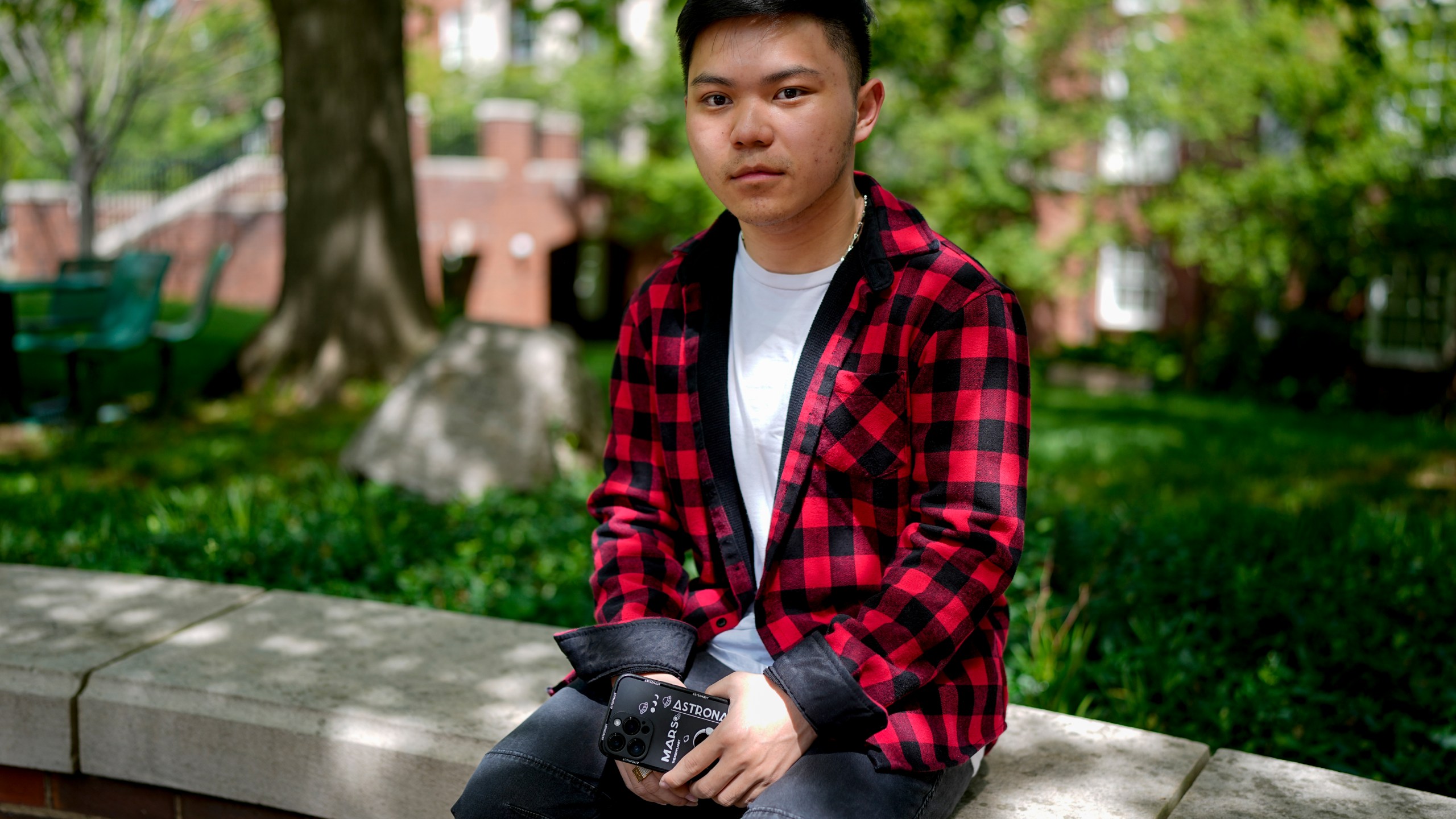 Bao Le, 18, sits for a photo on Tuesday, April 23, 2024, in Nashville, Tenn. The Associated Press spoke with teenagers and young adults about their experiences on social media and what they wish they had known when they first got online. (AP Photo/George Walker IV)