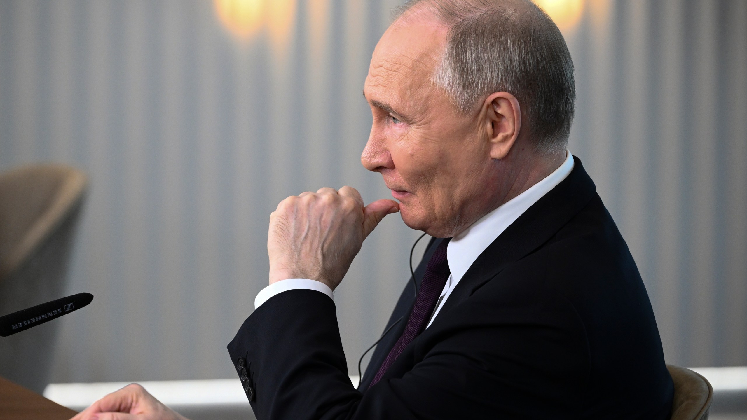 Russian President Vladimir Putin listens to a journalist's question as he meets with senior news leaders of international news agencies on the sidelines of the St. Petersburg International Economic Forum at the Lakhta Center skyscraper, the headquarters of Russian gas monopoly Gazprom in St. Petersburg, Russia, on Wednesday, June 5, 2024. (Vladimir Astapkovich, Sputnik, Kremlin Pool Photo via AP)