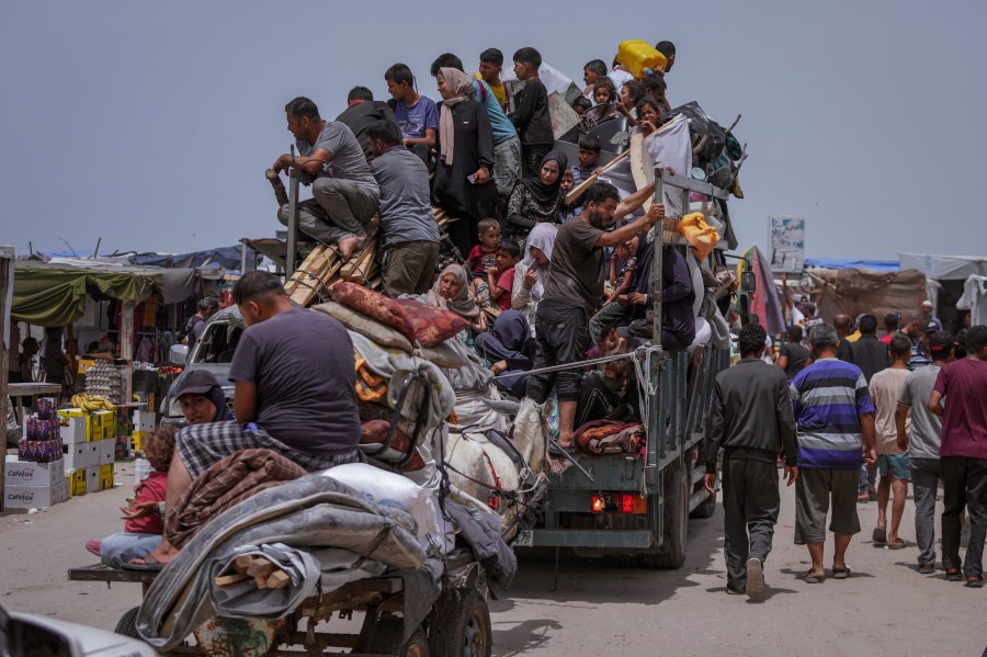 FILE - Palestinians fleeing from the southern Gaza city of Rafah during an Israeli ground and air offensive in the city on Tuesday, May 28, 2024. A single image, not even an authentic photograph, is the focus of a singular campaign on Instagram that has caught the attention of the algorithm and captured the imaginations of users across national borders — a show of support for the Palestinian movement as the war between Israel and Hamas enters its eighth month. (AP Photo/Abdel Kareem Hana, File)