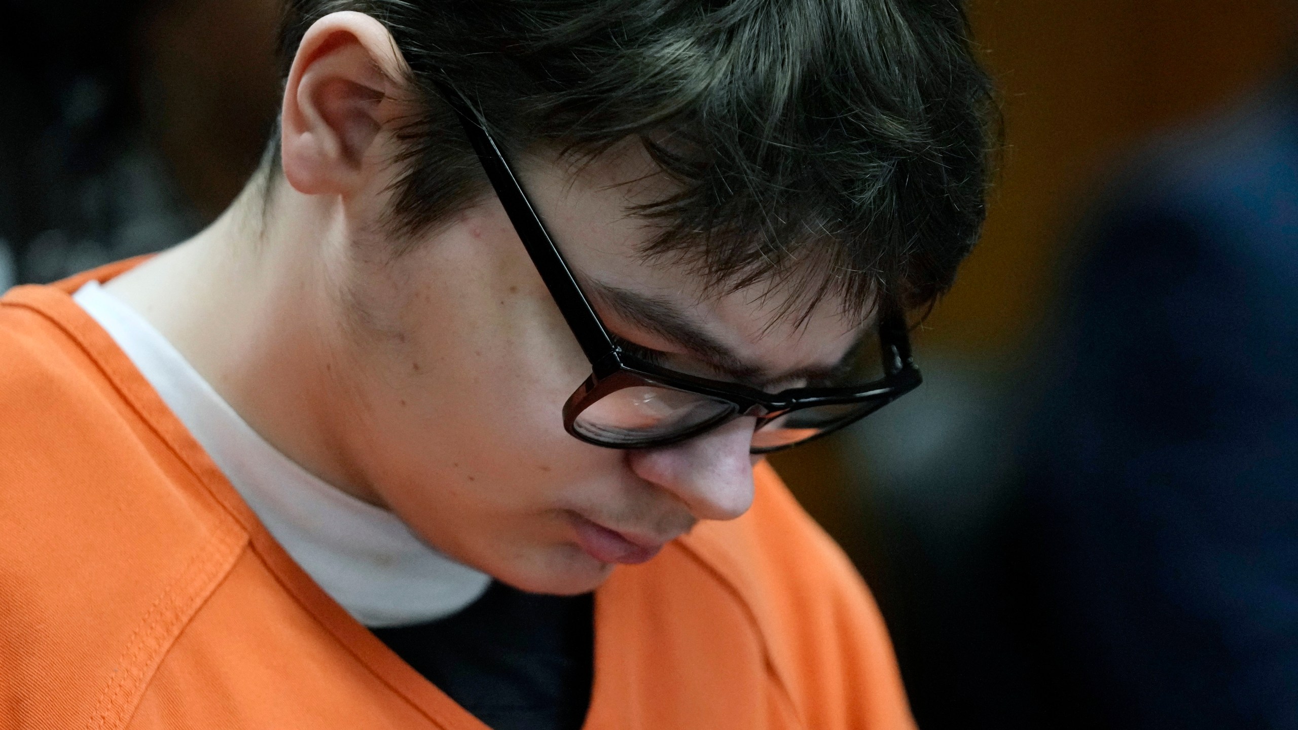 FILE - Ethan Crumbley sits in court listening to victim impact statements, Friday, Dec. 8, 2023, in Pontiac, Mich. A Michigan teen who was convicted of fatally shooting four students at his high school is appealing his life sentence, his attorneys announced Friday. (AP Photo/Carlos Osorio, Pool, file)