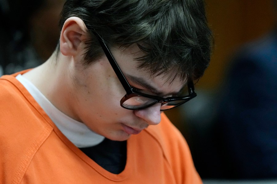 FILE - Ethan Crumbley sits in court listening to victim impact statements, Friday, Dec. 8, 2023, in Pontiac, Mich. A Michigan teen who was convicted of fatally shooting four students at his high school is appealing his life sentence, his attorneys announced Friday. (AP Photo/Carlos Osorio, Pool, file)