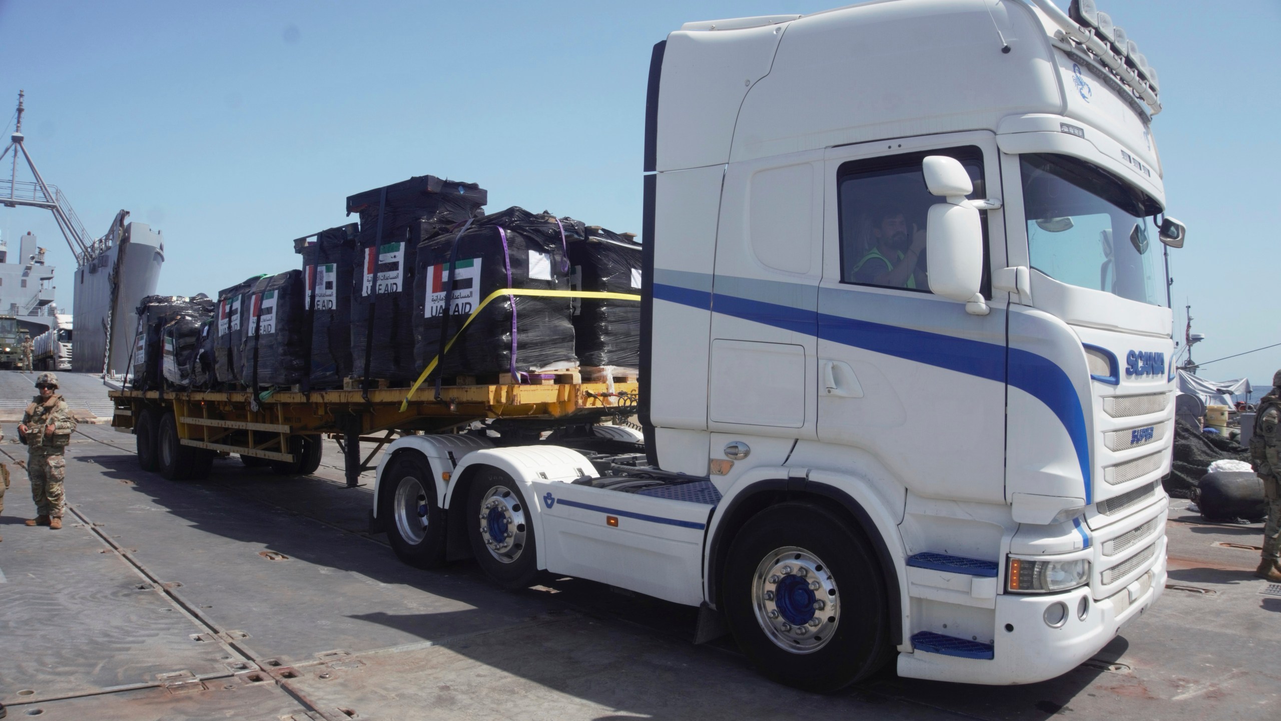 In this photo provided by U.S. Central Command, humanitarian aid arrives in Gaza, Saturday, June 8, 2024. (U.S. Central Command via AP)