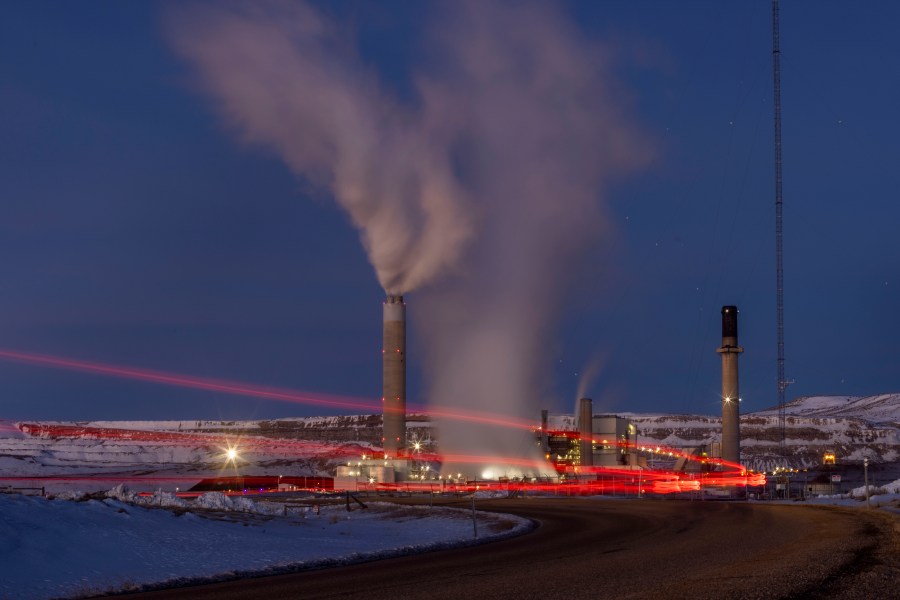 FILE - Taillights trace the path of a motor vehicle at the Naughton Power Plant, Jan. 13, 2022, in Kemmerer, Wyo. Bill Gates and his energy company are starting construction at their Wyoming site adjacent to the coal plant for a next-generation nuclear power plant he believes will “revolutionize” how power is generated. (AP Photo/Natalie Behring, File)