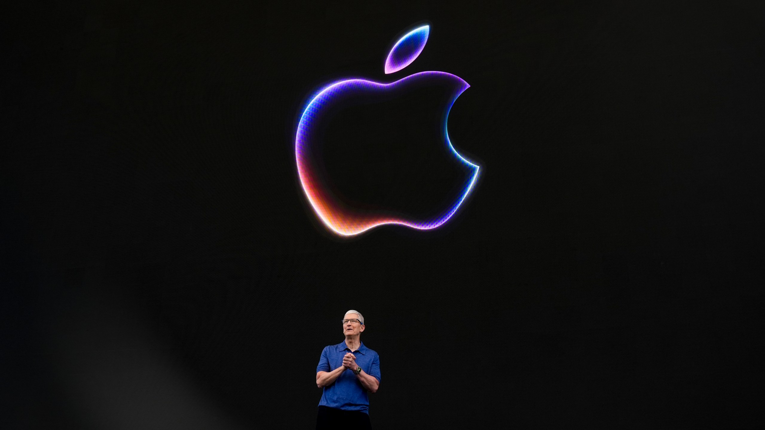 Apple CEO Tim Cook speaks during an announcement of new products on the Apple campus in Cupertino, Calif., Monday, June 10, 2024. (AP Photo/Jeff Chiu)