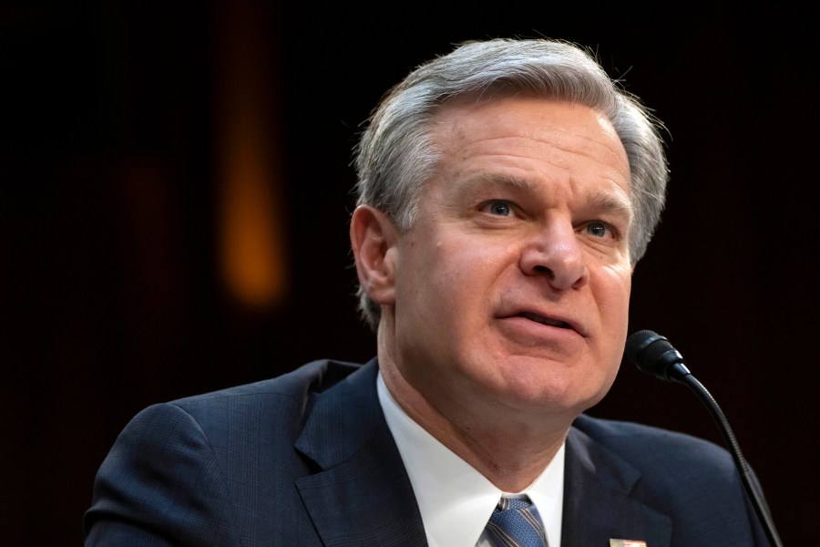 FBI Director Christopher Wray speaks during a hearing of the Senate Intelligence Committee on Capitol Hill, March 11, 2024, in Washington. Eight individuals from Tajikistan with suspected ties to the Islamic State have been arrested in the United States in recent days. (AP Photo/Mark Schiefelbein, File)