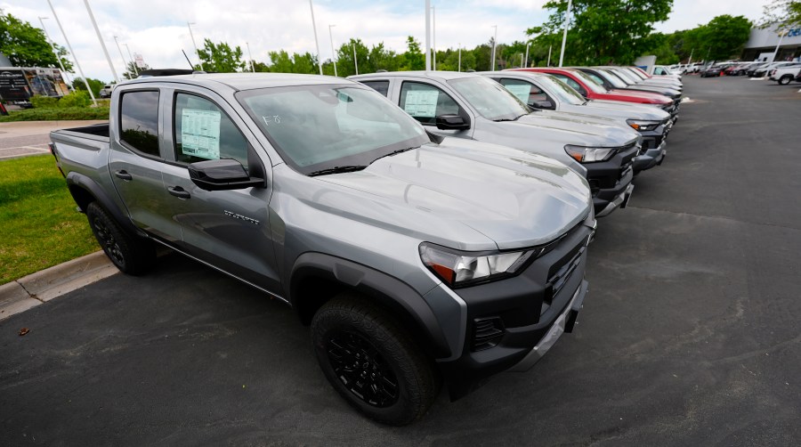 Unsold 2024 Colorado pickup trucks sit in a row outside a Chevrolet dealership Sunday, June 2, 2024, in Lone Tree, Colo. On Wednesday, June 12, 2024, the Labor Department issues its report on prices at the consumer level in May. (AP Photo/David Zalubowski)