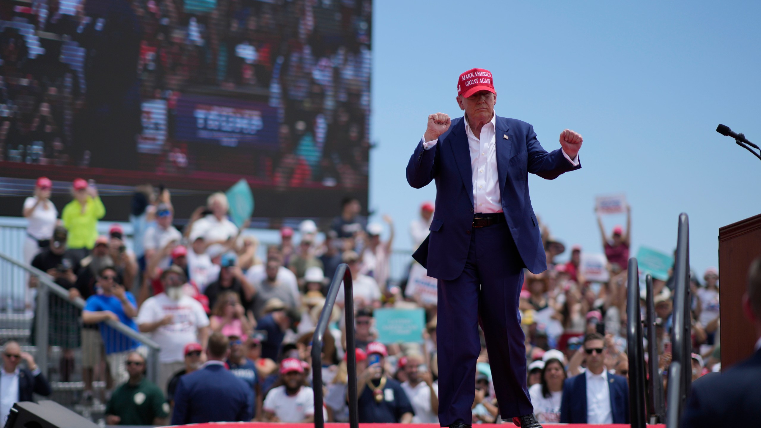 Republican presidential candidate, former President Donald Trump motions after speaking at a campaign rally Sunday, June 9, 2024, in Las Vegas. (AP Photo/John Locher)