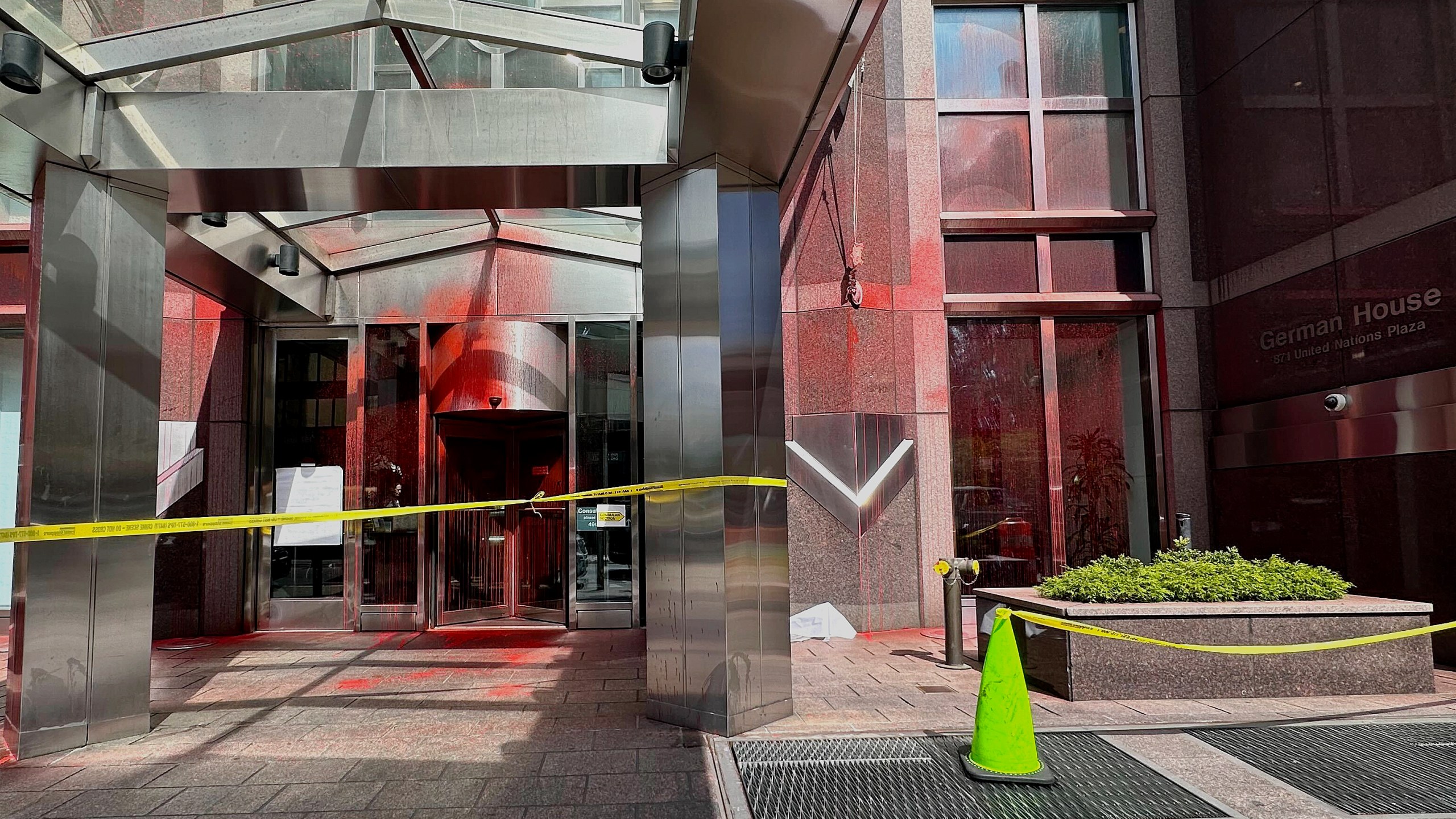 Red paint covers portions of the entrance to the German consulate building, Wednesday, June 12, 2024, in New York. Pro-Palestinian protesters have vandalized locations associated with the Brooklyn Museum and United Nations in New York City, throwing red paint across their entrances in opposition to the ongoing war between Israel and Hamas in Gaza. (AP Photo/Sophie Rosenbaum)