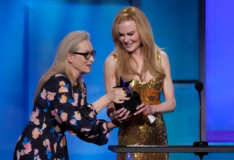 FILE - Meryl Streep, left, presents the 49th AFI Life Achievement Award to Nicole Kidman, Saturday, April 27, 2024, at the Dolby Theatre in Los Angeles. The tribute will air on TNT on Monday. (AP Photo/Chris Pizzello, File)