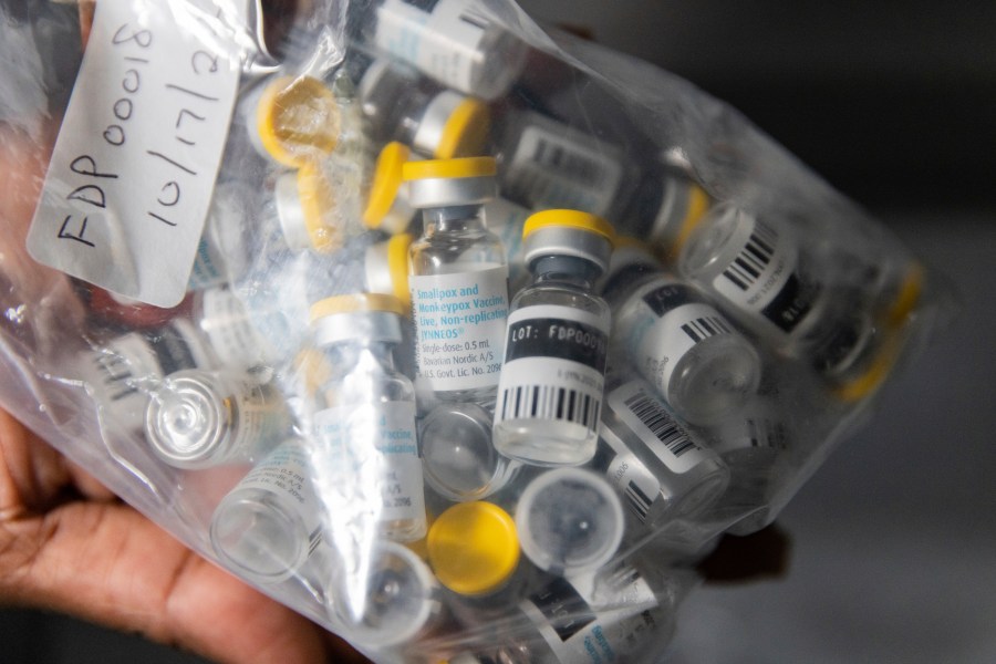 FILE - Vials of single doses of the Jynneos vaccine for mpox are seen from a cooler at a vaccinations site on Aug. 29, 2022, in the Brooklyn borough of New York. South African health authorities have reported two deaths from mpox in the space of three days. Health Minister Joe Phaahla says Thursday the two fatalities this week were among six recent confirmed cases of mpox in South Africa, all of them men in their 30s.(AP Photo/Jeenah Moon, File)