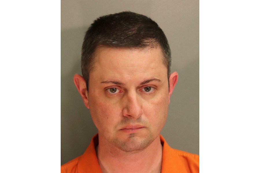 This photo provided by the Montgomery County Detention Center in April 2021, shows Christopher Bauer. On Friday, June 14, 2024, the former FBI agent was convicted of sexually assaulting an 11-year-old girl while serving as an Alabama state trooper — a law enforcement job he landed even after he was kicked out of the FBI amid earlier claims that he raped a co-worker at knifepoint. (Montgomery County Detention Center via AP)