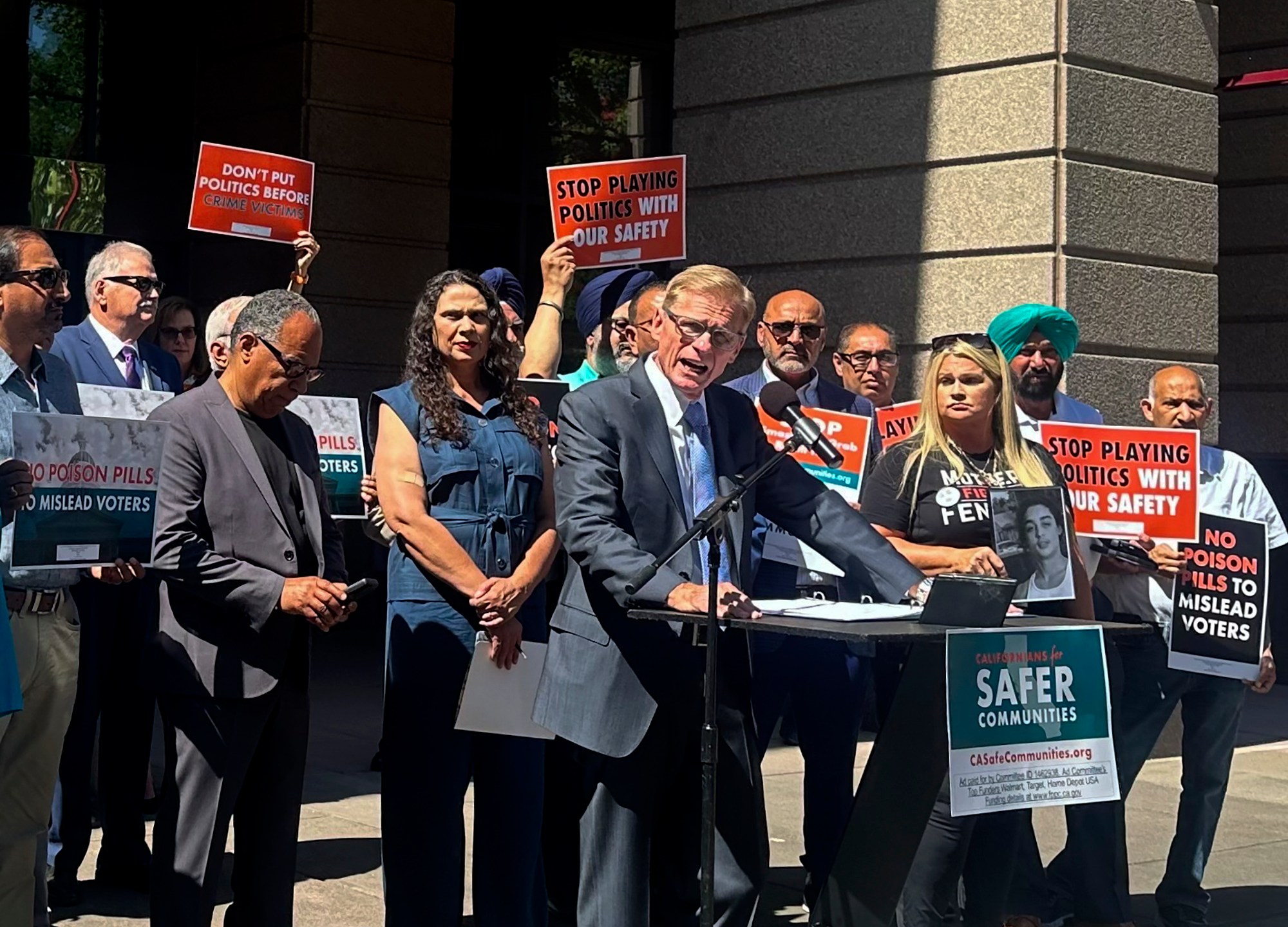 Greg Totten, a representative of Californians for Safer Communities, speaks at a press conference about a ballot initiative to bring back penalties for shoplifting and drug offenses on Wednesday, June 12, 2024 in Sacramento, Calif. The coalition blasts a plan by California Democratic leadership to void a legislative package of 14 retail theft proposals if voters approve the tough-on-crime ballot initiative in November. (AP Photo/Tran Nguyen)