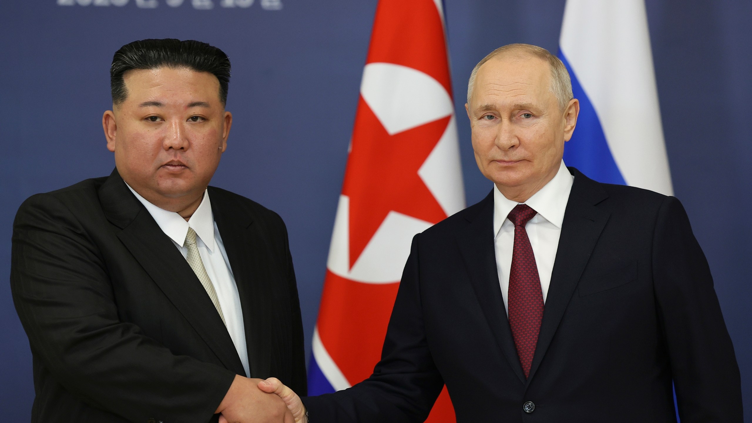 FILE - Russian President Vladimir Putin, right, and North Korea's leader Kim Jong Un shake hands during their meeting at the Vostochny cosmodrome outside the city of Tsiolkovsky, about 200 kilometers (125 miles) from the city of Blagoveshchensk in the far eastern Amur region, Russia, on Sept. 13, 2023. North Korean state media says Russian President Vladimir Putin will arrive in the country on Tuesday for a two-day visit, his first trip to the country in 24 years. (Vladimir Smirnov, Sputnik, Kremlin Pool Photo via AP, File)