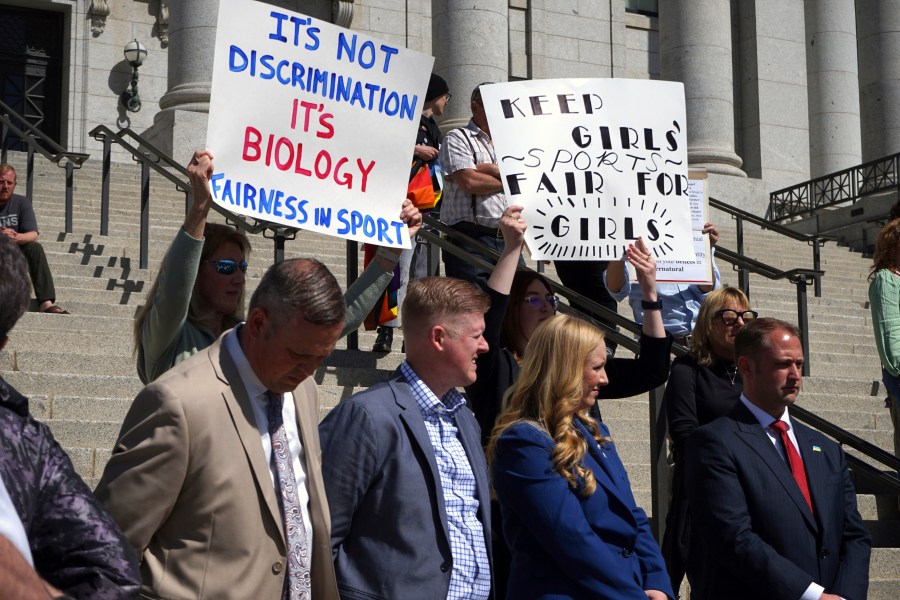 FILE - Lawmakers listen as parents speak about the prospect of their children competing against transgender girls in school sports at the Utah State Capitol on March 25, 2022, in Salt Lake City. A federal judge on Monday, June 17, 2024 temporarily blocked the Biden administration’s new Title IX rule expanding protections for LGBTQ+ students in six additional states, dealing another setback for a new policy that has been under legal attack by Republican attorneys general. (AP Photo/Samuel Metz, File)