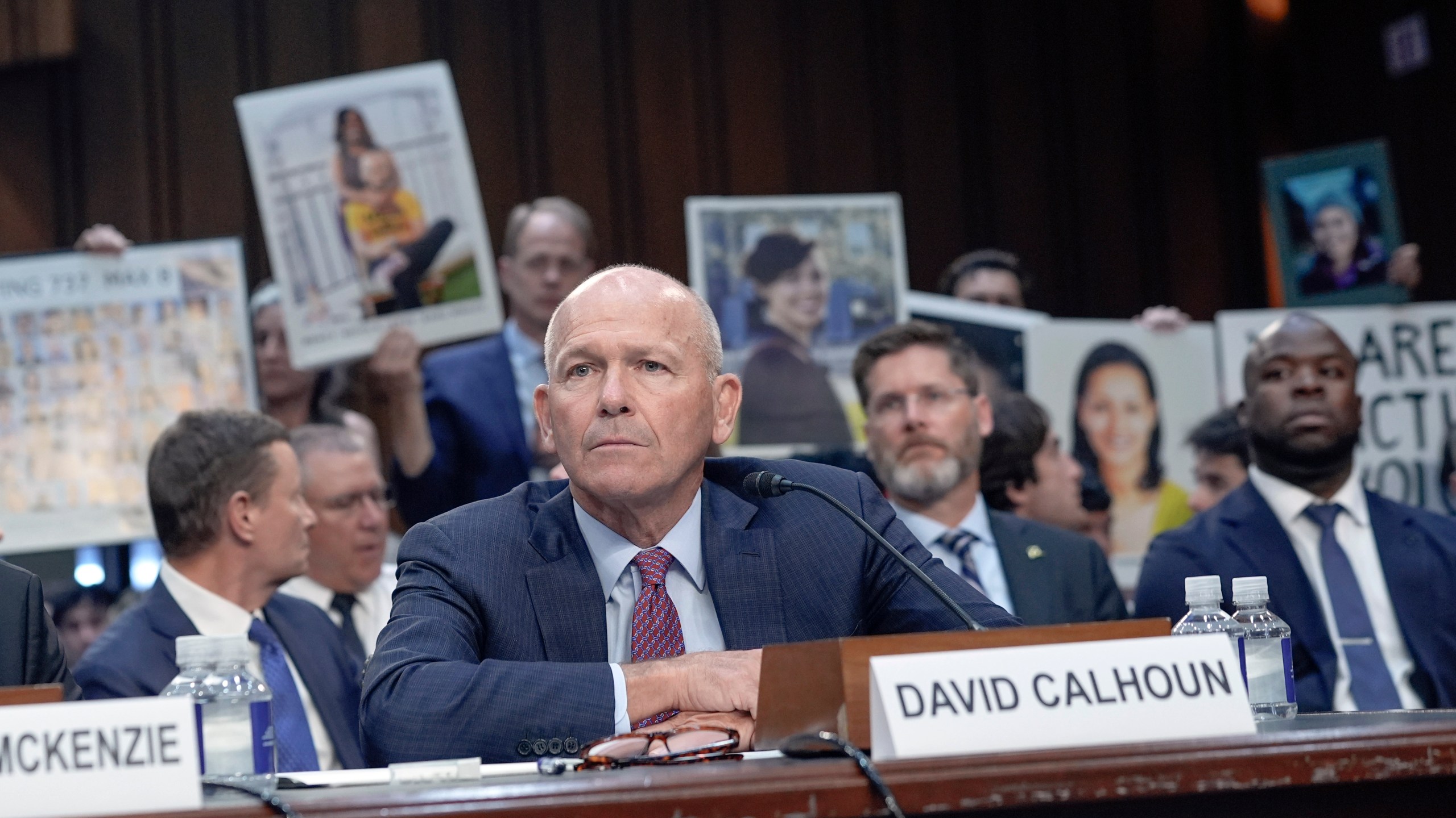 Boeing CEO Dave Calhoun, center, testifies at a Senate Homeland Security Subcommittee on Investigations hearing on Capitol Hill Tuesday, June 18, 2024, in Washington. (AP Photo/Mariam Zuhaib)