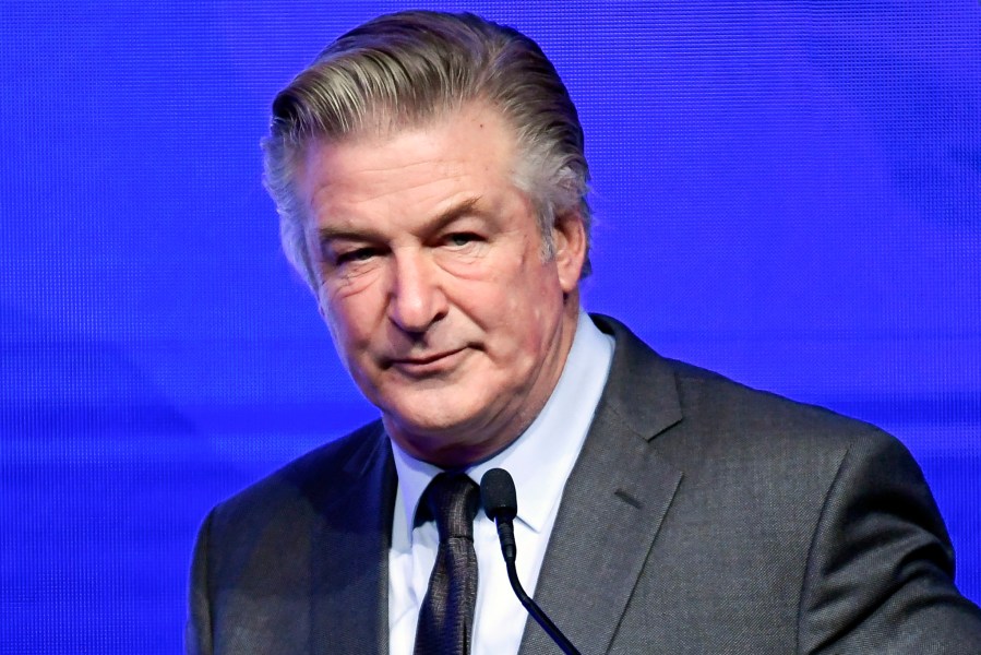 FILE - Alec Baldwin emcees the Robert F. Kennedy Human Rights Ripple of Hope Award Gala at New York Hilton Midtown on Dec. 9, 2021, in New York. A New Mexico judge is scheduled to consider at a Friday, June 21, 2024, hearing, whether to compel a movie set armorer to testify at actor Baldwin's involuntary manslaughter trial for the fatal shooting of a cinematographer during rehearsal for the Western movie “Rust.” (Photo by Evan Agostini/Invision/AP, File)