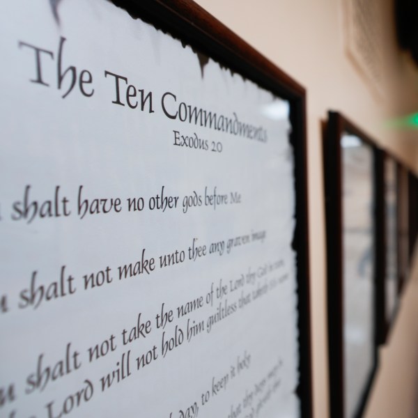 FILE - A copy of the Ten Commandments is posted along with other historical documents in a hallway of the Georgia Capitol, Thursday, June 20, 2024, in Atlanta. Civil liberties groups filed a lawsuit Monday, June 24, challenging Louisiana’s new law that requires the Ten Commandments to be displayed in every public school classroom. (AP Photo/John Bazemore, File)