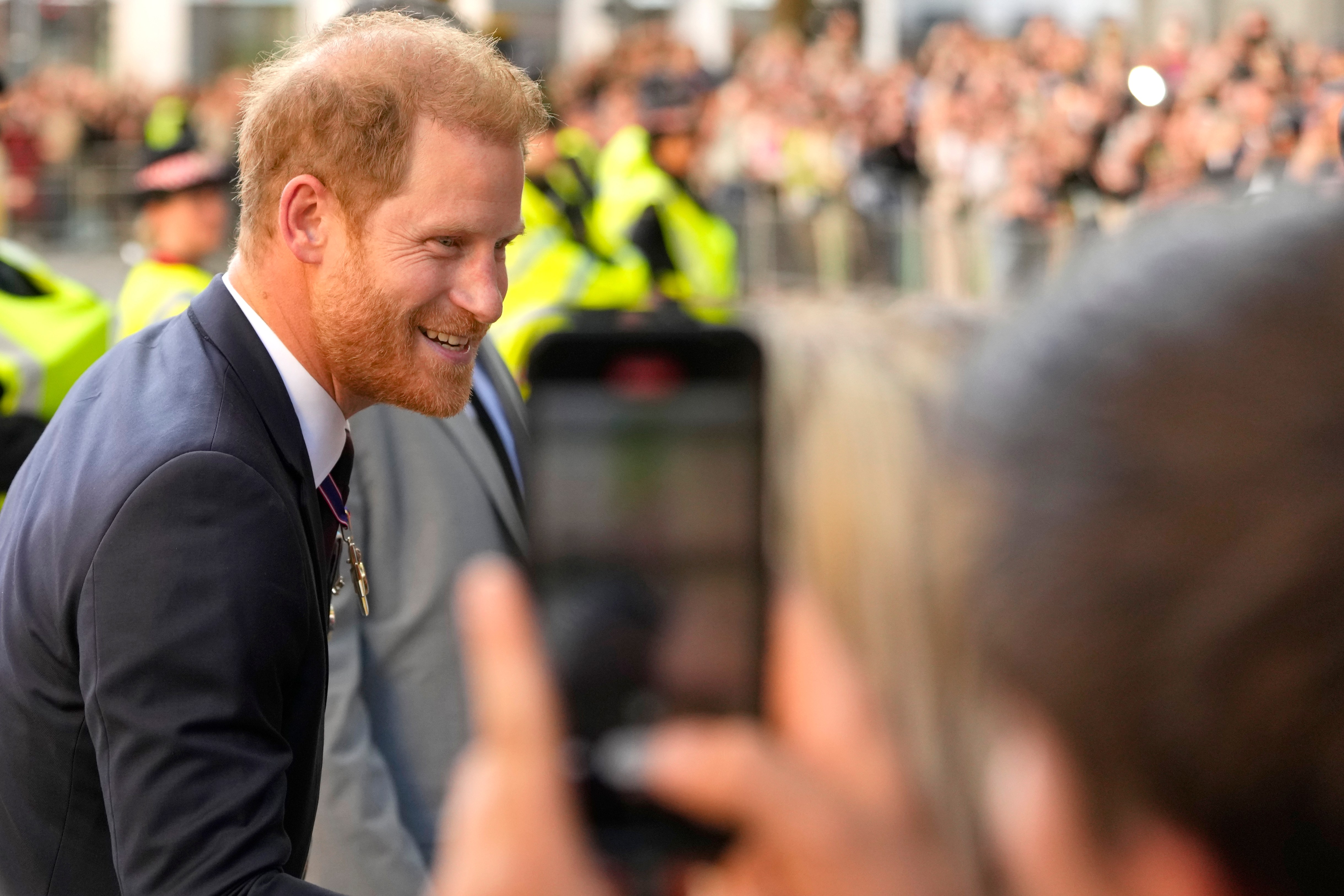 FILE - Britain's Prince Harry meets the crowd as he leaves after attending an Invictus Games Foundation 10th Anniversary Service of Thanksgiving at St Paul's Cathedral in London, on May 8, 2024. An attorney for the publisher of The Sun tabloid Thursday accused Prince Harry of engaging in “shocking” and “extraordinary” obfuscation by destroying evidence it was seeking in his lawsuit claiming the newspaper violated his privacy by unlawfully snooping on him. (AP Photo/Kirsty Wigglesworth, File)