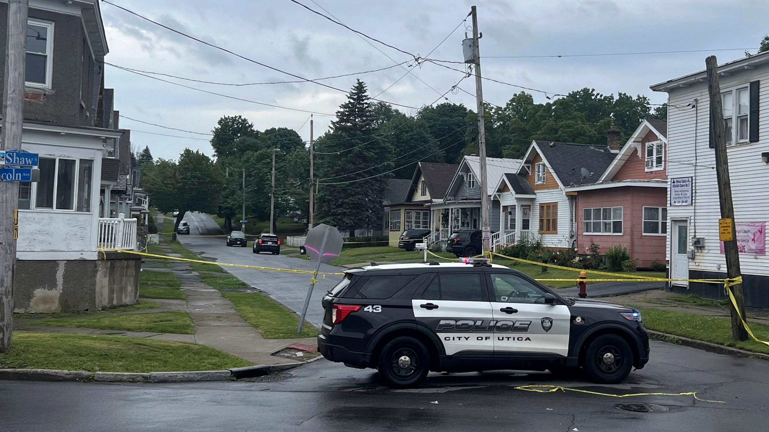 Police investigate the scene of Friday nights shooting in Utica, N.Y., early Saturday, June 29, 2024. An officer shot and killed a teen fleeing while pointing a replica gun, police said Saturday. (Kenny Lacy Jr./Syracuse.com via AP)