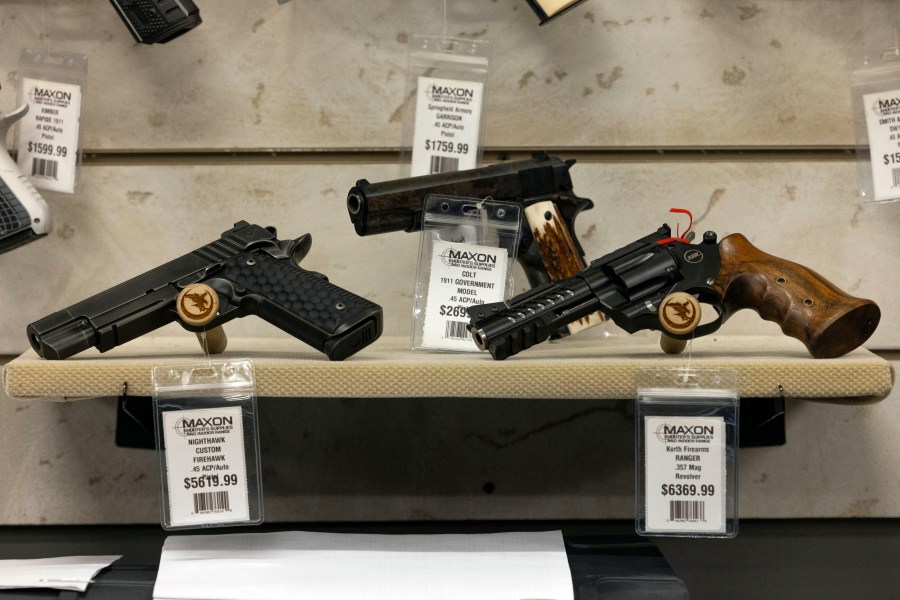 Guns for sale are displayed at Maxon Shooter's Supplies in Des Plaines, Ill.