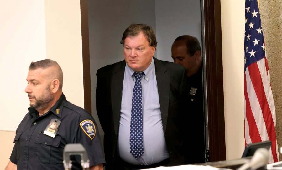 Rex Heuermann, center, charged in the Gilgo Beach killings, arrives in court June 6, 2024.