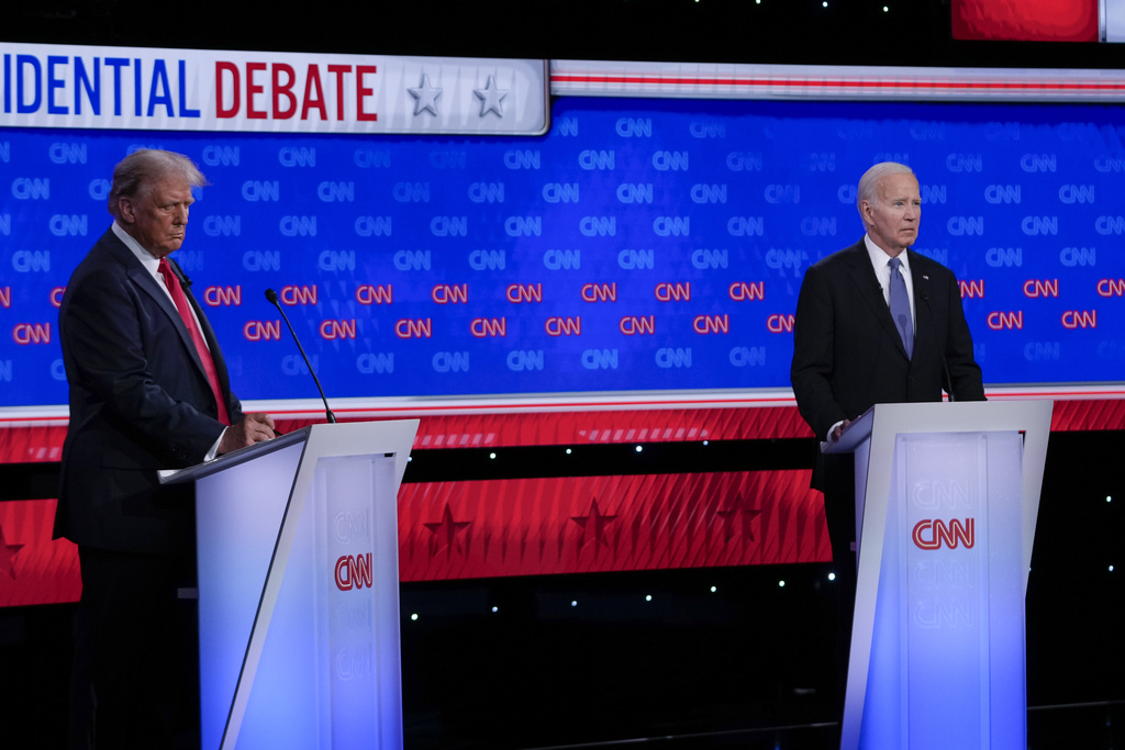 President Joe Biden, right, and Republican presidential candidate former President Donald Trump, left, during a presidential debate hosted by CNN, Thursday, June 27, 2024, in Atlanta. (AP Photo/Gerald Herbert)