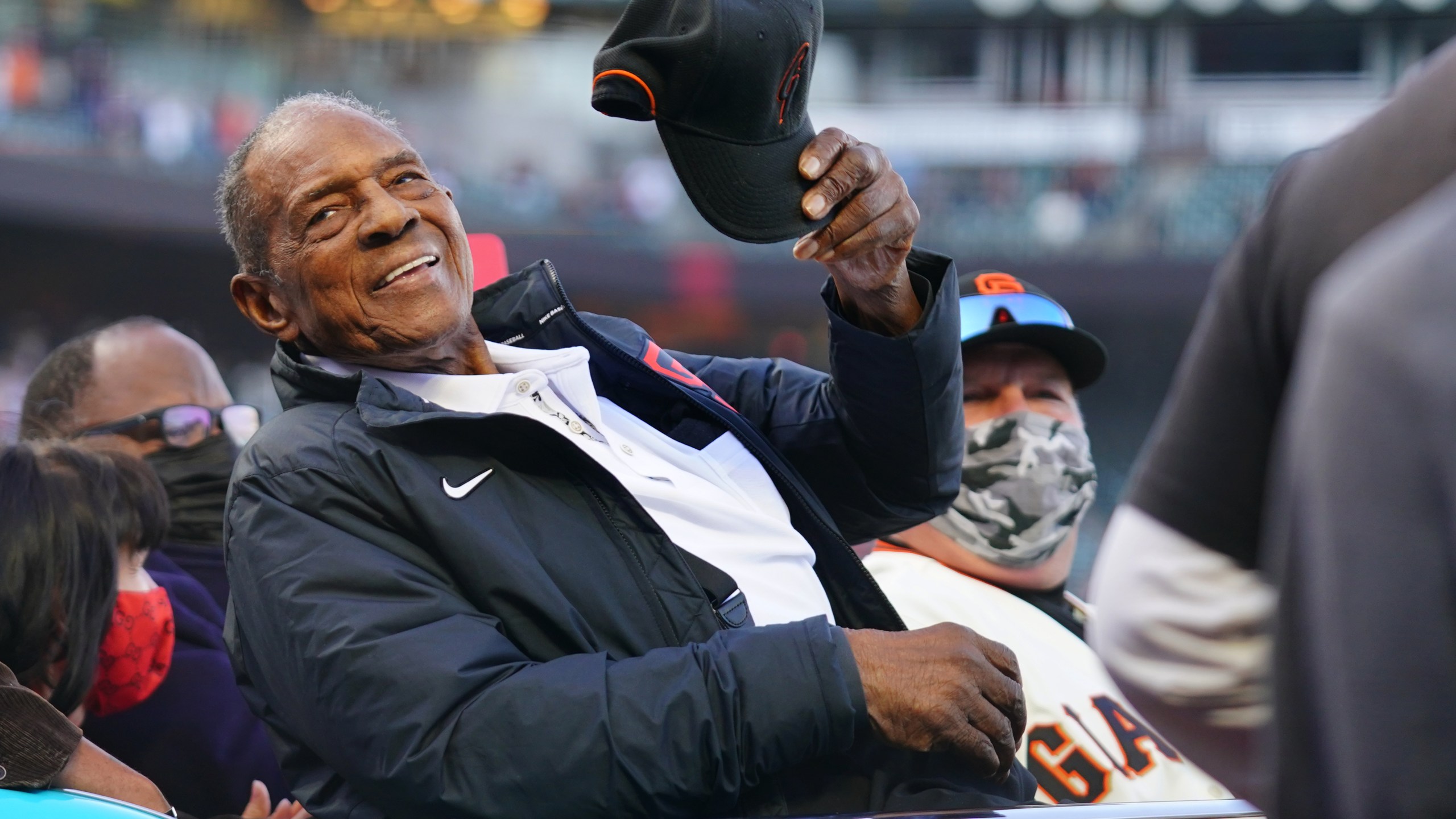 Hall of Famer Willie Mays waves to the crowd during the pre-game celebration in honor of his 90th birthday