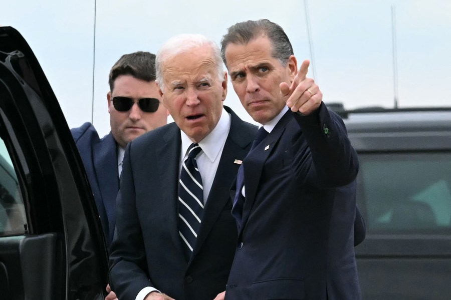 TOPSHOT-US-POLITICS-BIDEN-ARRIVAL TOPSHOT - US President Joe Biden talks with his son Hunter Biden upon arrival at Delaware Air National Guard Base in New Castle, Delaware, on June 11, 2024, as he travels to Wilmington, Delaware. A jury found Hunter Biden guilty on June 11 on federal gun charges in a historic first criminal prosecution of the child of a sitting US president. The 54-year-old son of President Joe Biden was convicted on all three of the federal charges facing him, CNN and other US media reported. (Photo by ANDREW CABALLERO-REYNOLDS / AFP) (Photo by ANDREW CABALLERO-REYNOLDS/AFP via Getty Images)