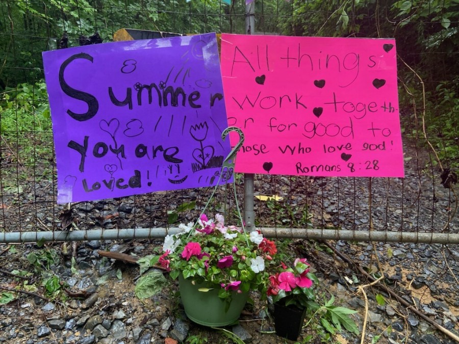 Posters and banners bring awareness for missing child, Summer Wells. 