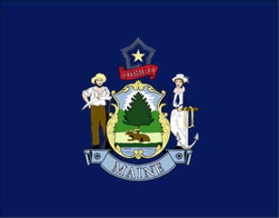 A blue flag with the Maine state seal on it.