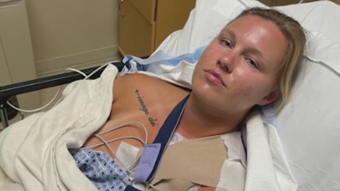 Army National Guard Specialist Karoline Stancik in hospital bed