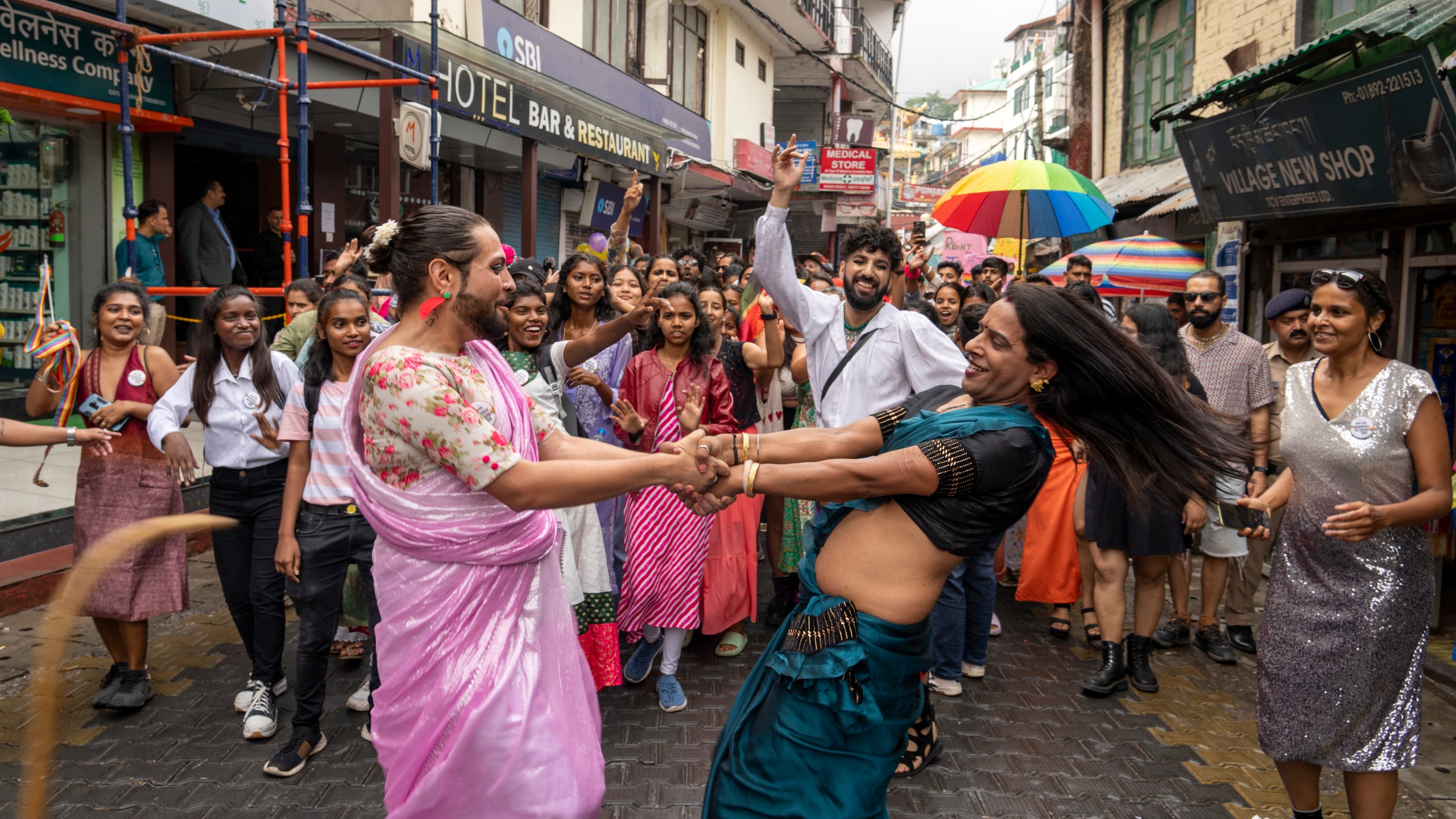 Activists and supporters of the LGBTQ community participate in a Pride walk in Dharamshala, India, Sunday, June 30, 2024. (AP Photo/Ashwini Bhatia)