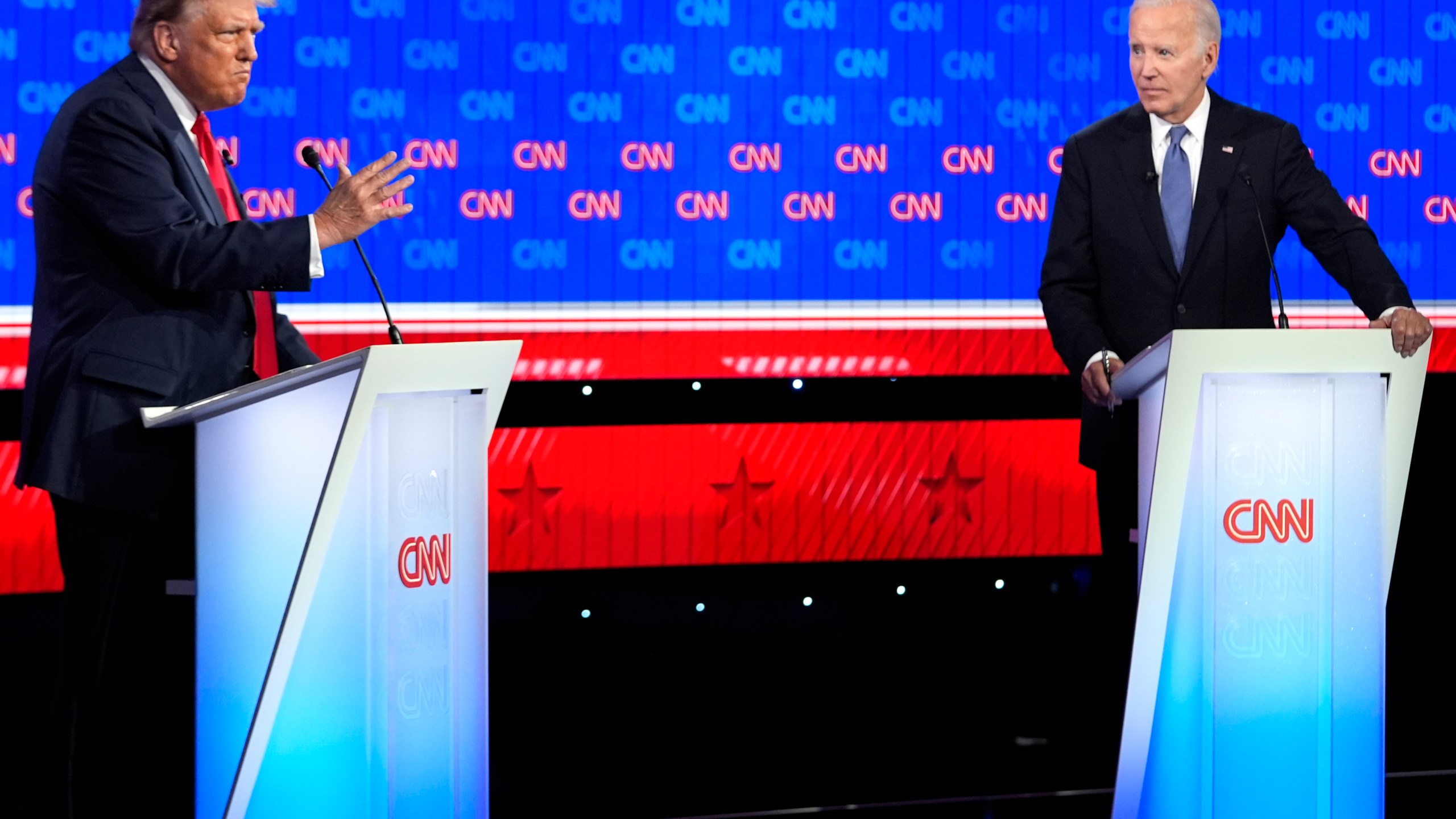 President Joe Biden, right, and Republican presidential candidate former President Donald Trump, left, participate in a presidential debate hosted by CNN, Thursday, June 27, 2024, in Atlanta. (AP Photo/Gerald Herbert)