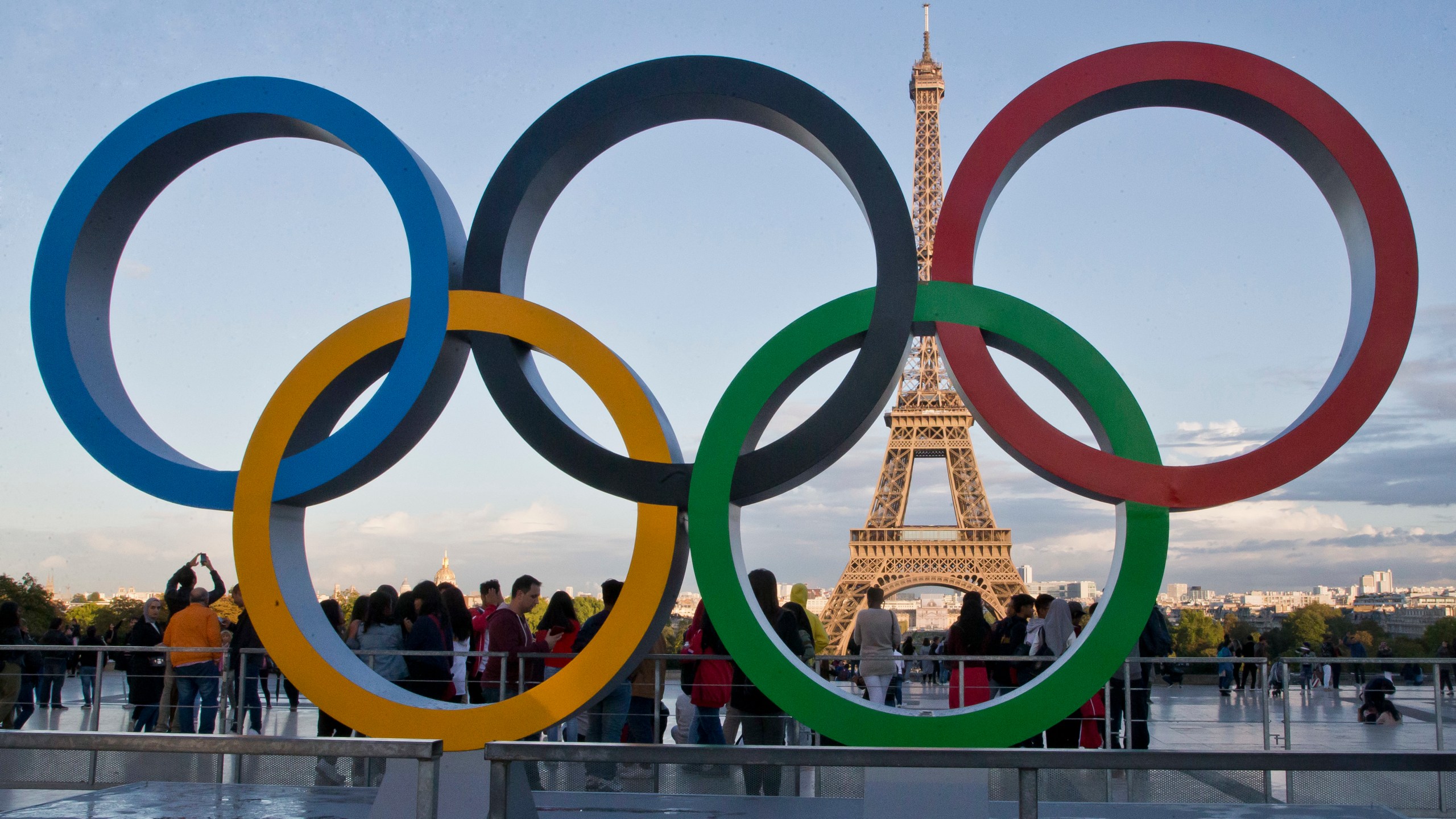 FILE - The Olympic rings are set up at Trocadero plaza that overlooks the Eiffel Tower in Paris, Sept. 14, 2017. Russia says that 10 of its wrestlers who were offered spots at the Paris Olympics as neutrals will refuse to compete. The Russian wrestling federation says that its officials, coaches and athletes held a meeting and “came to an unanimous decision — to refuse to participate in the Olympic Games.” (AP Photo/Michel Euler, File)