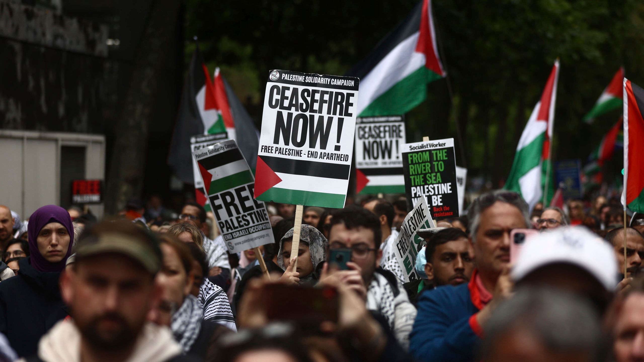 People take part in a pro-Palestinian march in central London, Saturday July 6, 2024. (Tejas Sandhu/PA via AP)