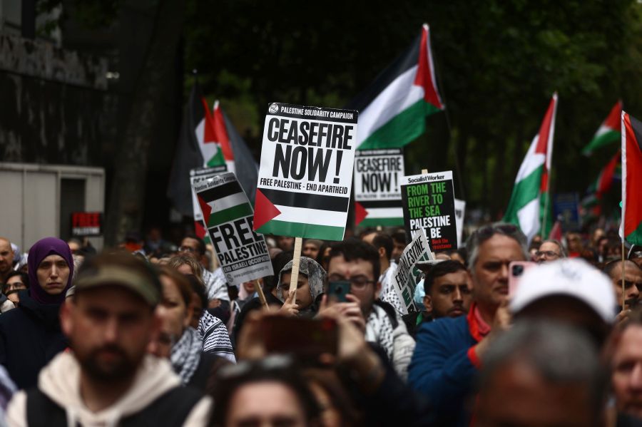 People take part in a pro-Palestinian march in central London, Saturday July 6, 2024. (Tejas Sandhu/PA via AP)