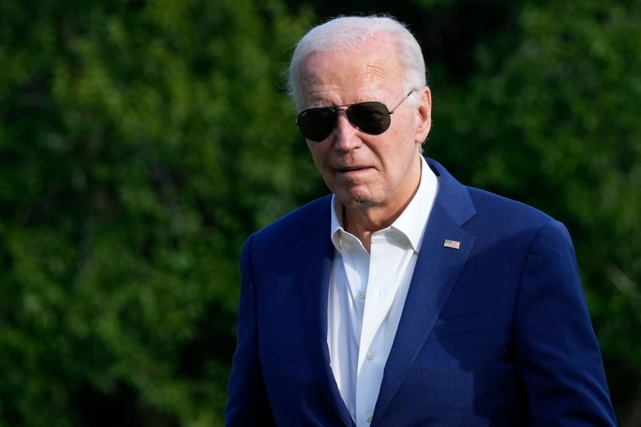 President Joe Biden walks across the South Lawn of the White House in Washington, Sunday, July 7, 2024, after returning from a trip to Pennsylvania. (AP Photo/Susan Walsh)