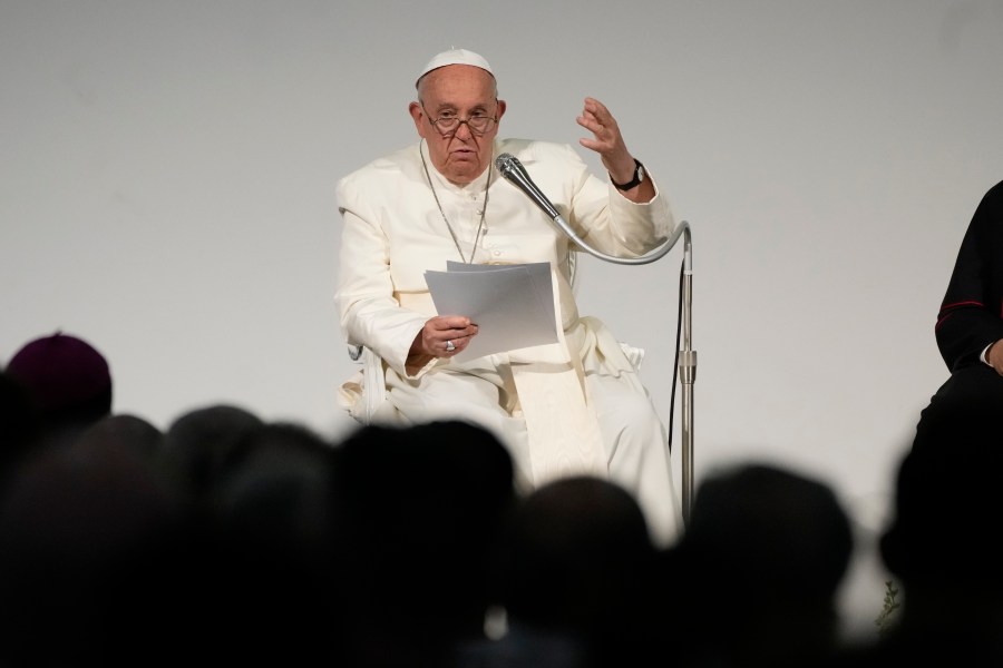 FILE - Pope Francis attends a meeting with the participants of the 50th Social Week of Catholics in Italy, in Trieste, Italy, on July 7, 2024. The Vatican’s chief prosecutor has strongly defended the integrity and fairness of the city state’s justice system, amid criticism that Pope Francis' absolute power and his interventions in the recently-concluded “trial of the century” violated the defendants’ fundamental rights. (AP Photo/Alessandra Tarantino, File)