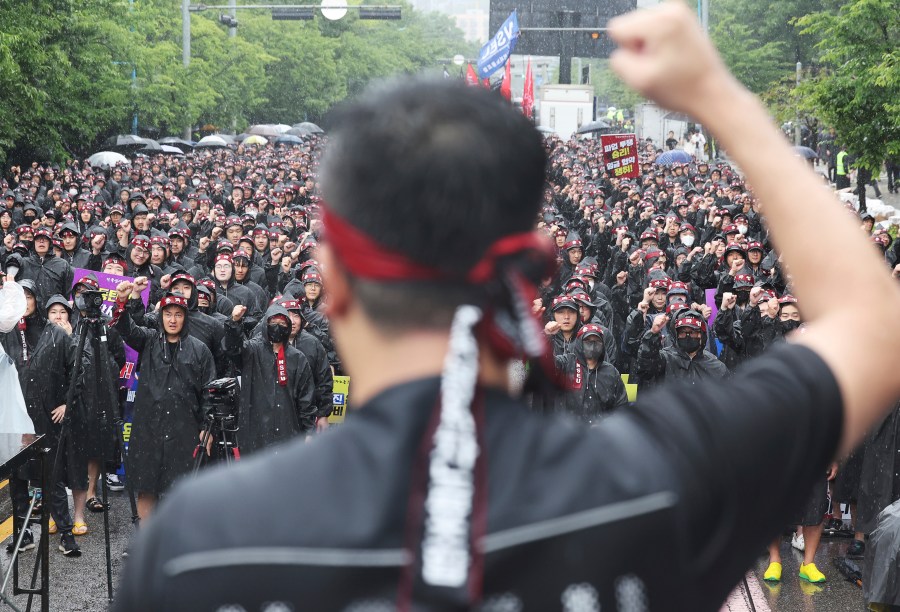 Members of the National Samsung Electronics Union shout slogans during a rally outside of Samsung Electronics' Hwaseong campus in Hwaseong, South Korea, Monday, July 8, 2024. Unionized workers at Samsung Electronics declared an indefinite strike Wednesday, July 10 to pressure South Korea’s biggest company to accept their calls for higher pays and other benefits. (Hong Ki-won/Yonhap via AP)