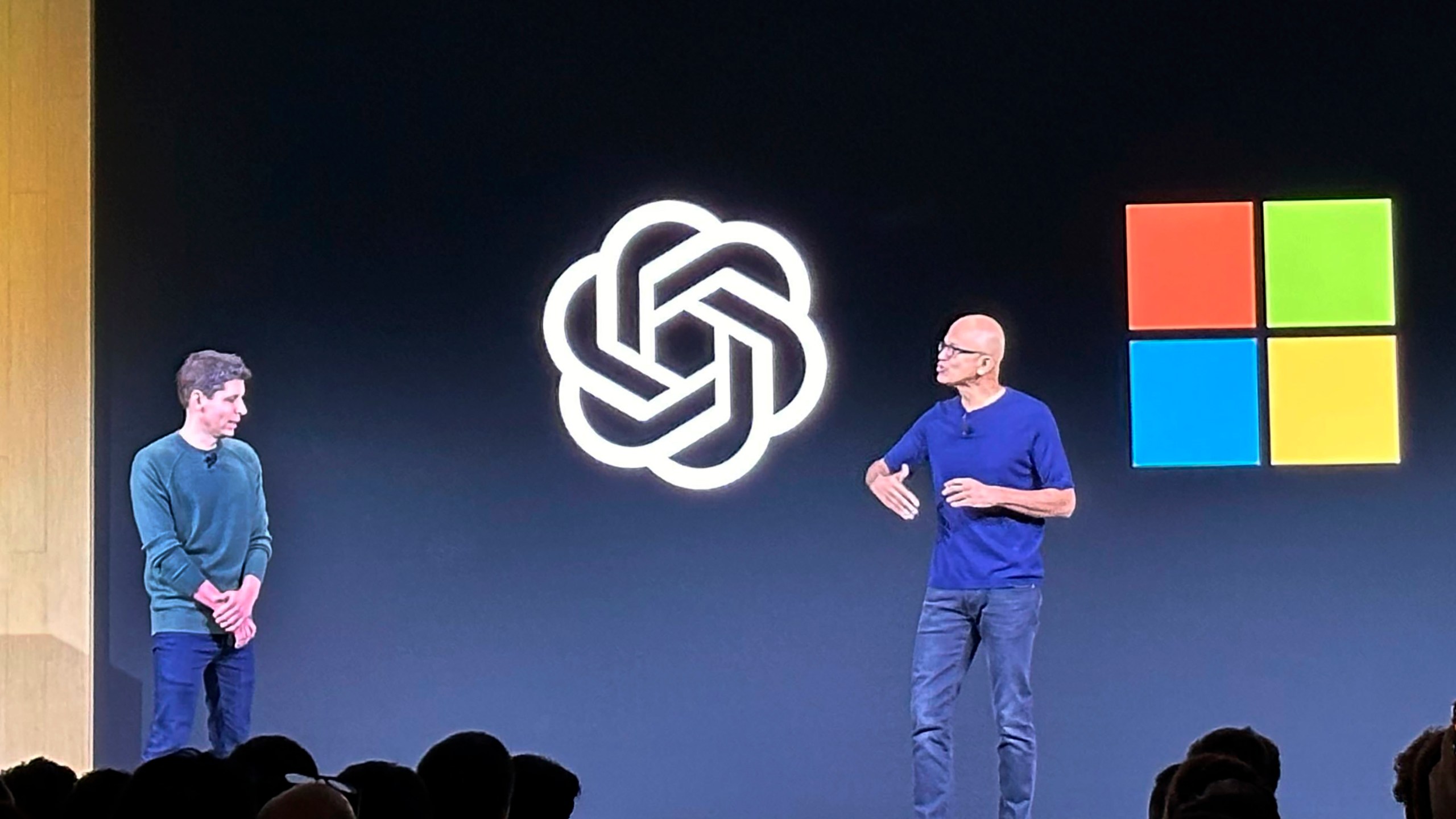 FILE - OpenAI CEO Sam Altman, left, appears onstage with Microsoft CEO Satya Nadella at OpenAI's first developer conference, on Nov. 6, 2023, in San Francisco. Microsoft has quit its seat on the board of OpenAI, saying its role is no longer needed because the ChatGPT maker has improved its governance since being roiled by boardroom chaos last year. In a letter sent on Tuesday, July 9, 2024, Microsoft confirmed it was resigning, “effective immediately,” from its role as an observer on the board. (AP Photo/Barbara Ortutay, File)