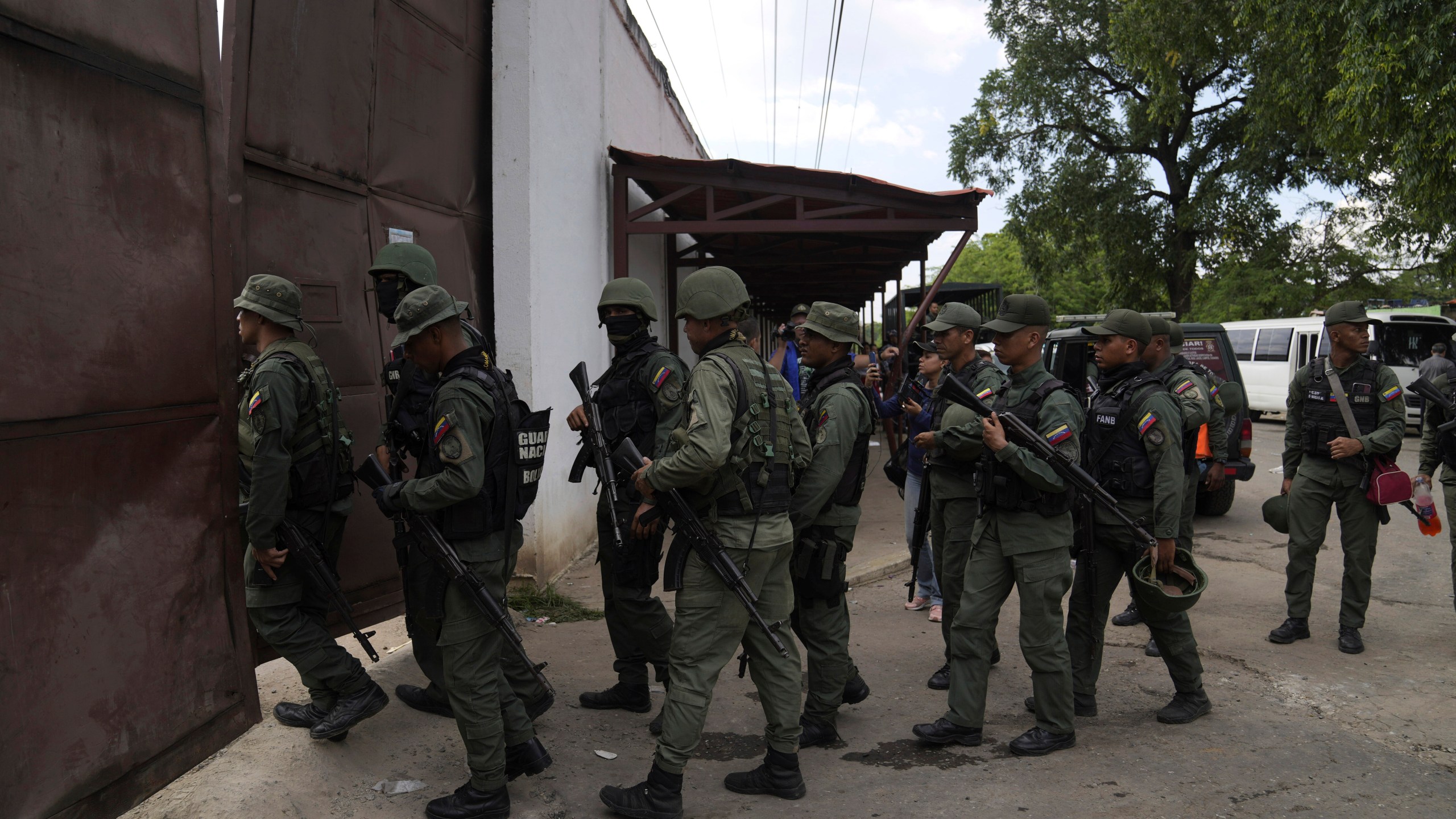 Soldiers raid the Tocorón Penitentiary Center, in Tocorón, Venezuela, Wednesday, Sept. 20, 2023.