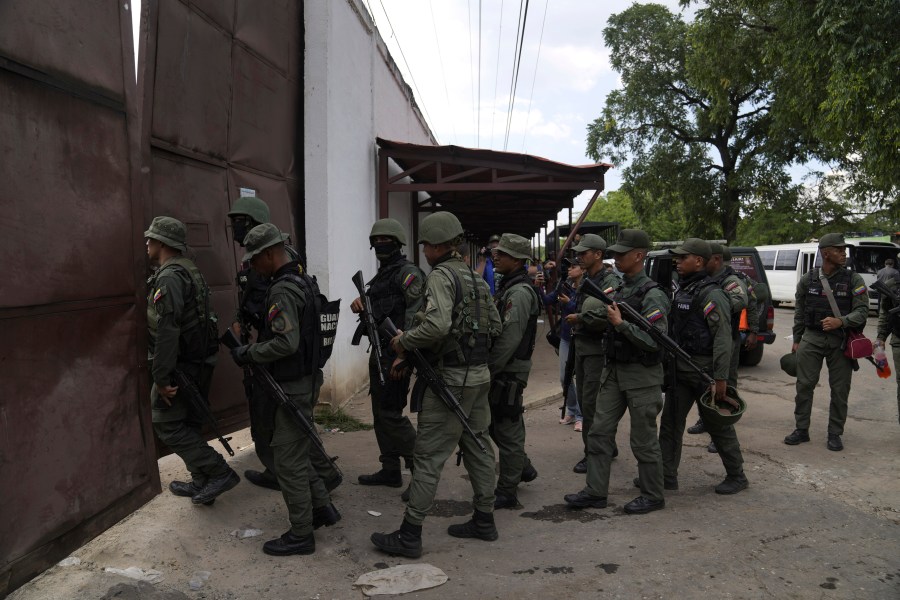 Soldiers raid the Tocorón Penitentiary Center, in Tocorón, Venezuela, Wednesday, Sept. 20, 2023.