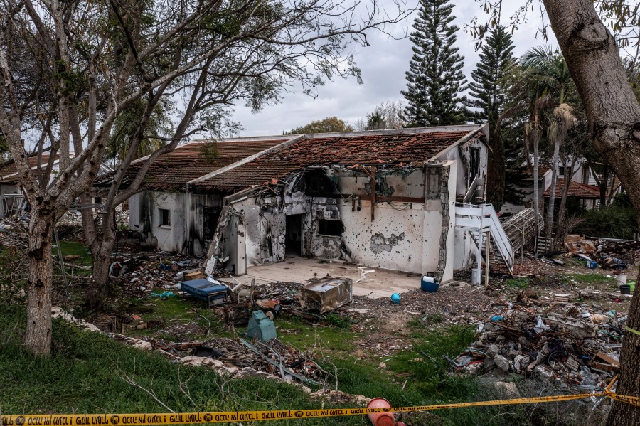 FILE - A battle-scarred home in Kibbutz Be'eri, an Israeli communal farm on the Gaza border, is seen on Thursday, Jan. 11, 2024. Hamas held more than a dozen hostages in the home when it overran southern Israel on Oct. 7. The Israeli military said Thursday that Israeli hostages held in a home that was struck by tank fire last Oct. 7 were killed by Hamas militants, not Israeli shelling, as it released the results of its first investigation into failures during the deadly attack that triggered the nine-month war in Gaza. (AP Photo/Tsafrir Abayov, File)